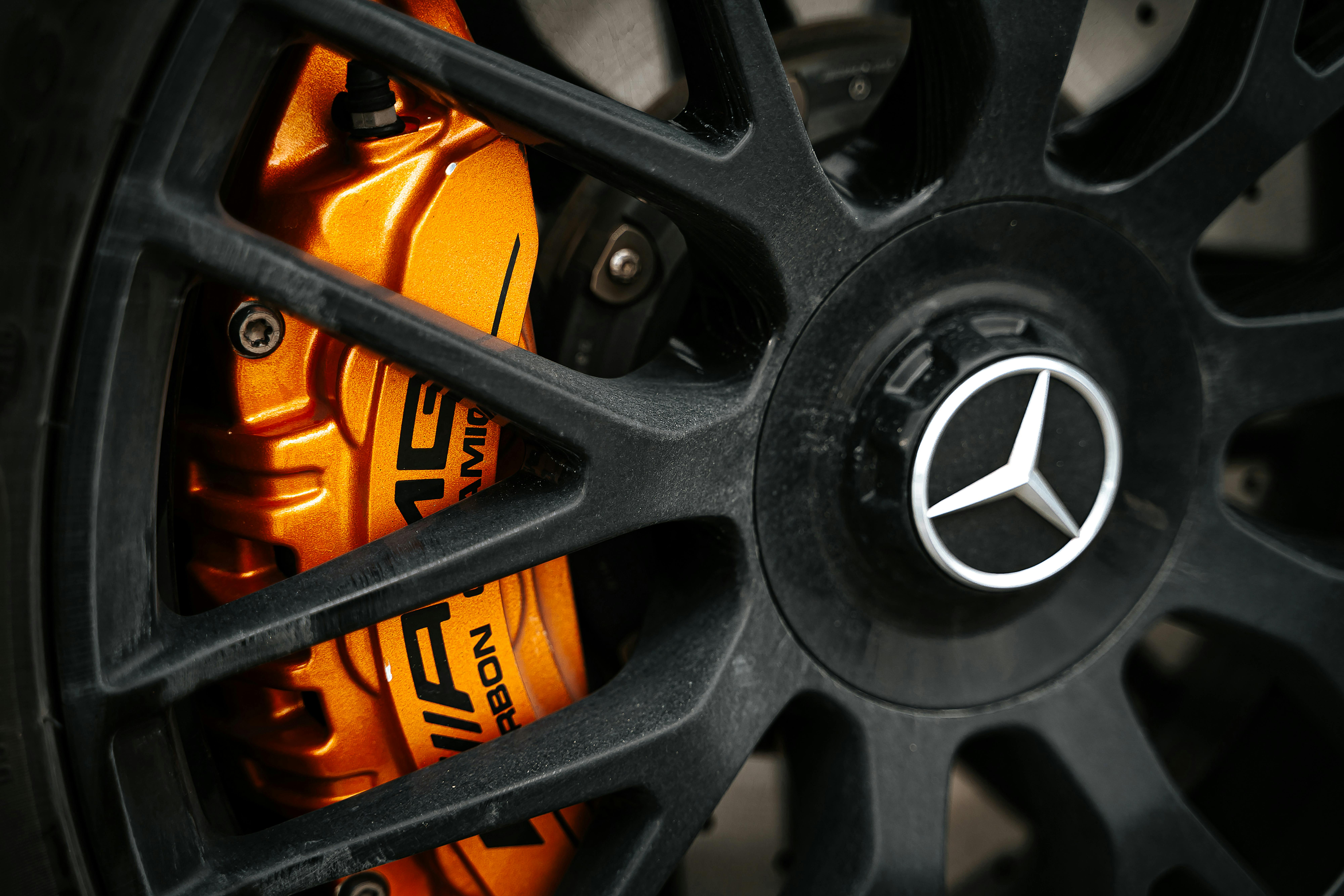 Performance brake caliper in orange — The Auto Surgeon